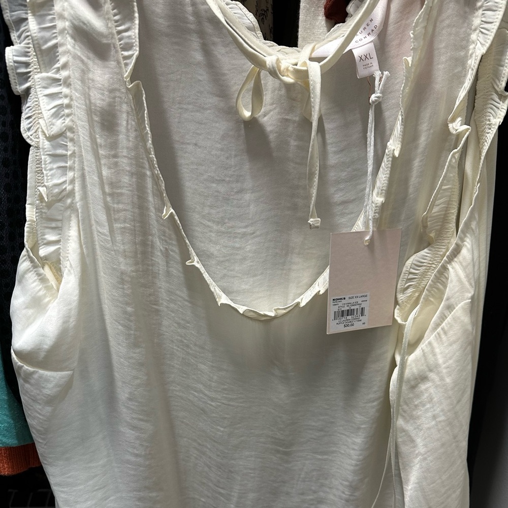NWT Lauren Conrad top cream colored with ruffle edges